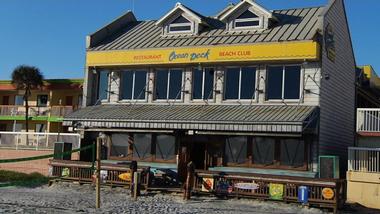 Have lunch with a view of the beach at Ocean Deck Restaurant & Beach Club