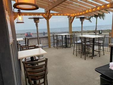 Admire the views while you dine at Riley’s by the Seawall